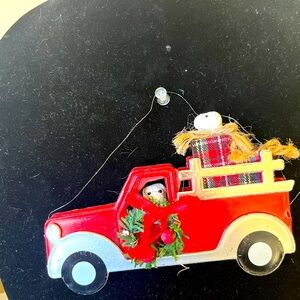 2 dogs in a truck ornament